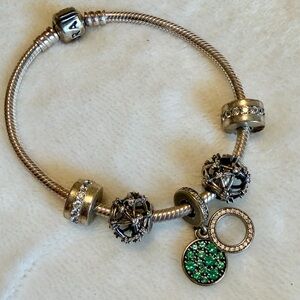 Pandora bracelet with 5 charms 7.5 inches